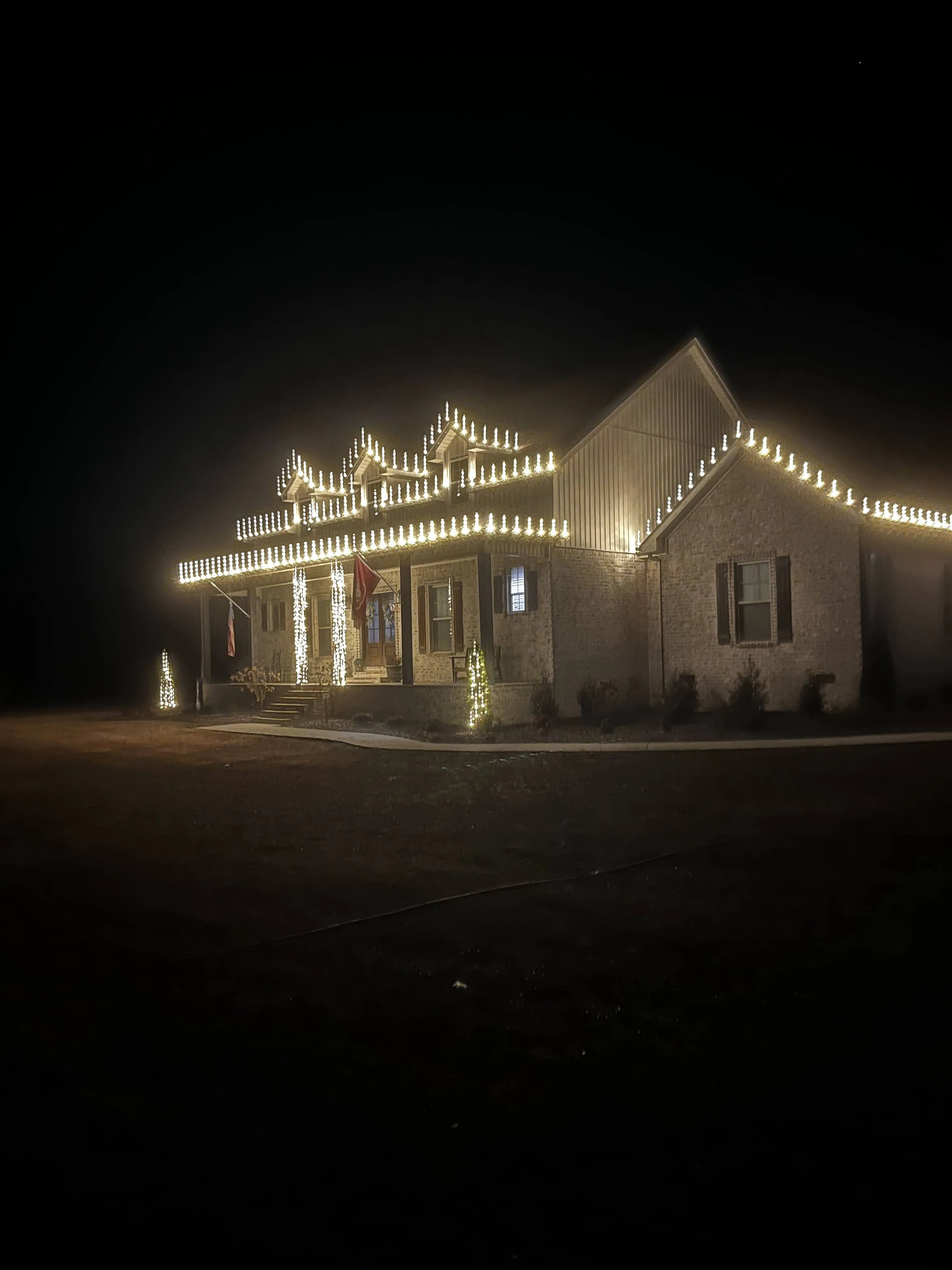 Christmas light installation in progress